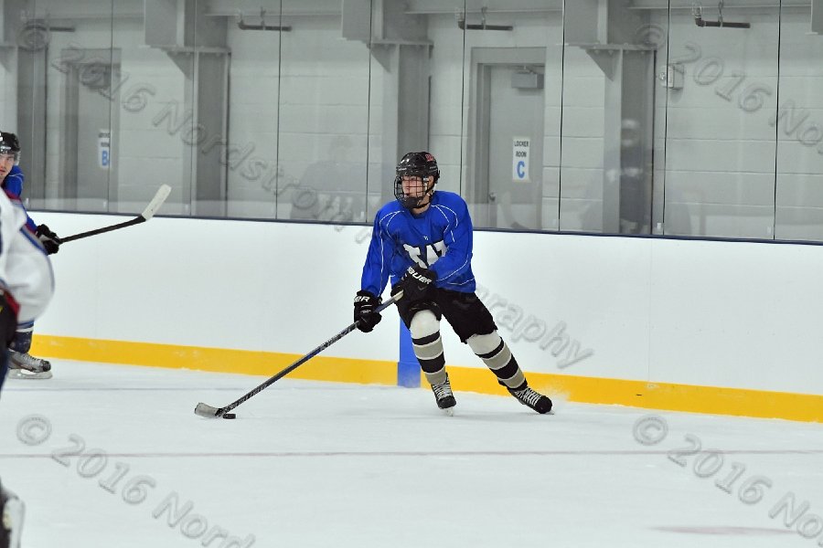 Wheaton College Men\'s Ice Hockey vs Middlesex Community College. - Photo By: KEITH NORDSTROM